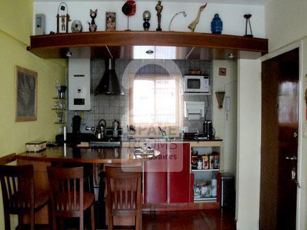 The dinning table and kitchen